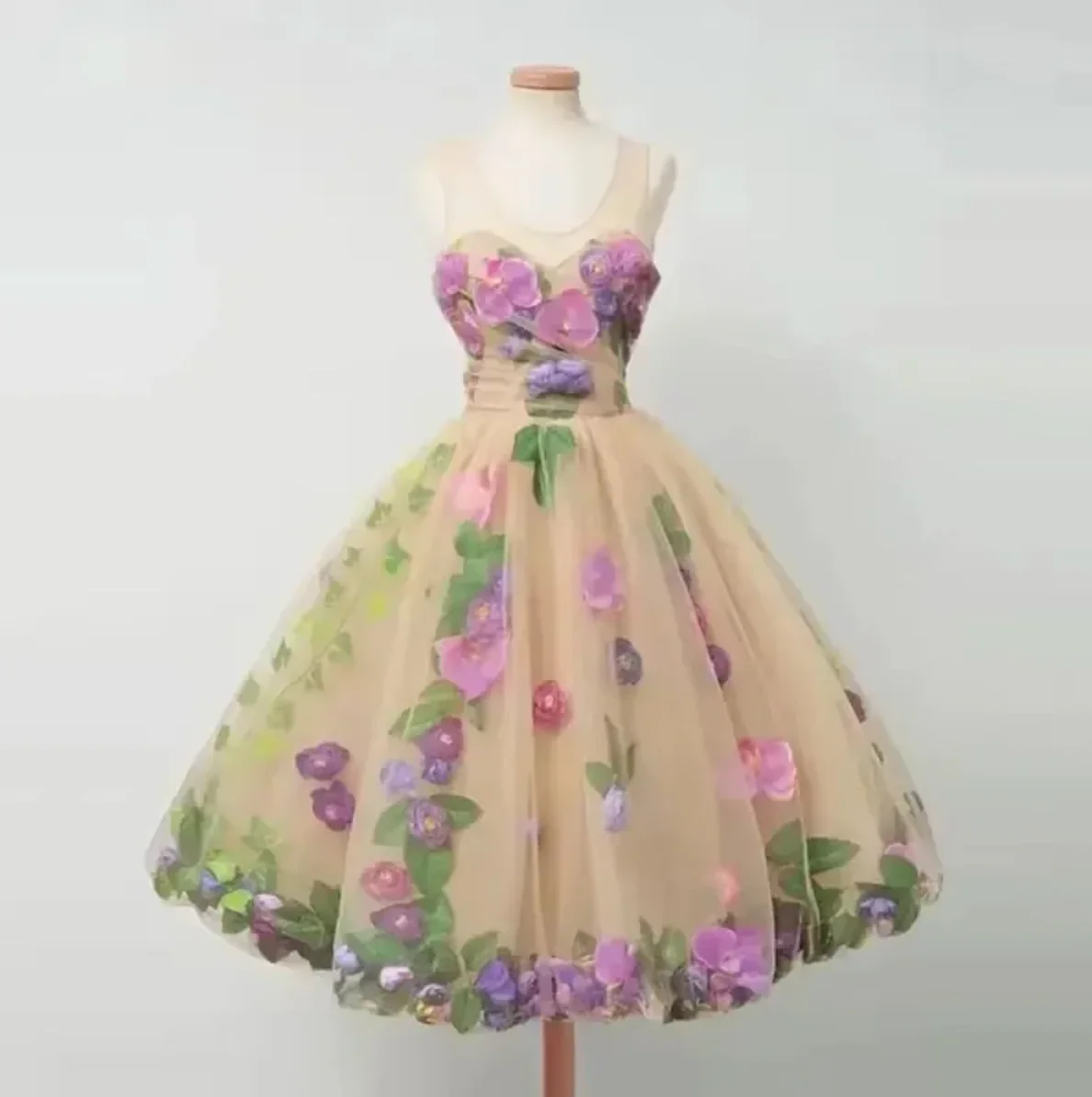 Intricate floral embroidery on silk occasion dress
